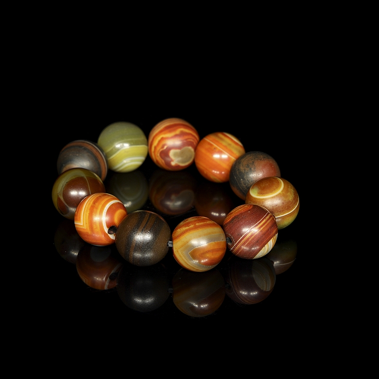 Antigua pulsera de once cuentas de ágata