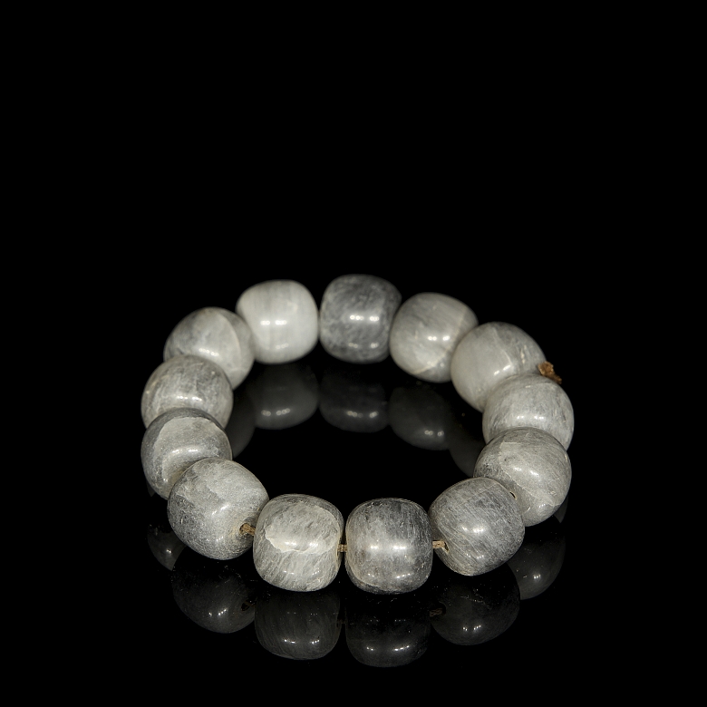 Bracelet with thirteen greyish jade beads, 20th century