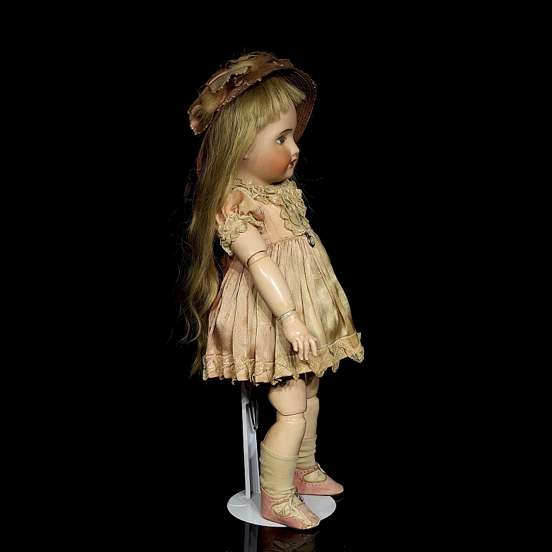 Muñeca de porcelana UNIS France, con sello