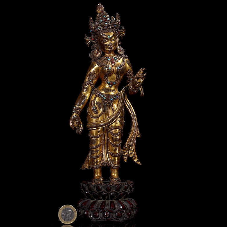 Figura de bronce dorado 