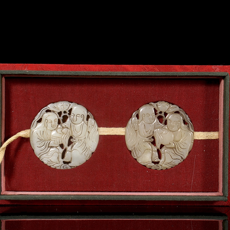 Pair of white jade pendants, ‘Characters with lotus’, Qing dynasty