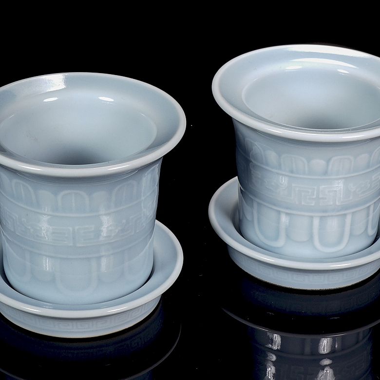Pair of porcelain flower pots with sky blue glaze, marked Qianglong