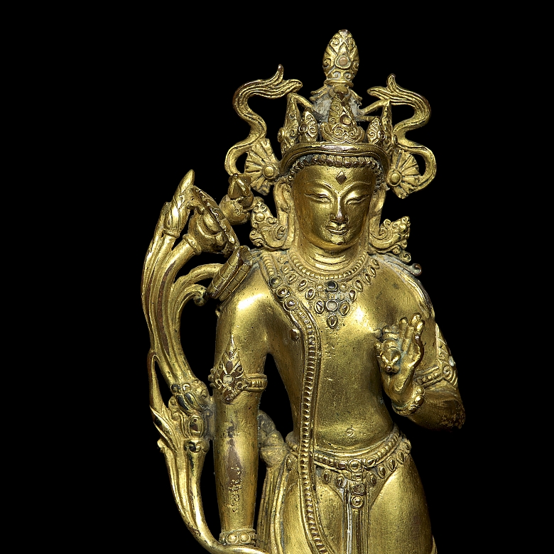 Grupo escultórico de bronce dorado 