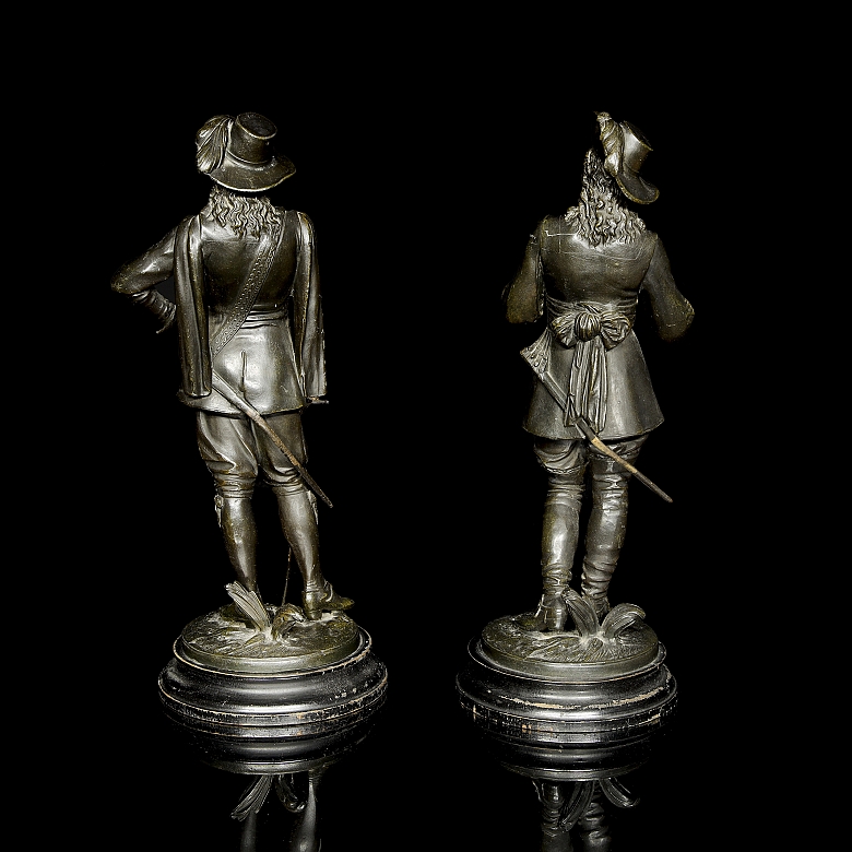 Pareja figuras de bronce 