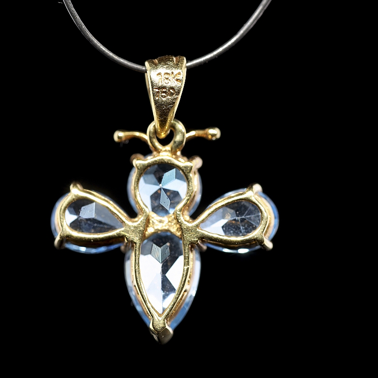 Colgante en oro amarillo de 18K con topacios