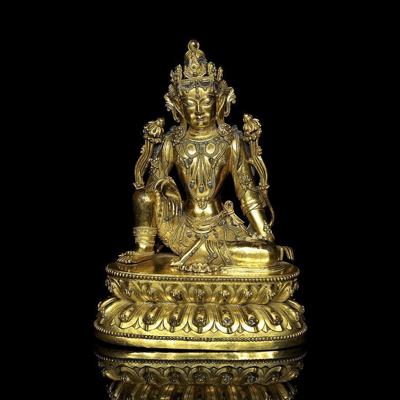 Figura de bronce dorado 